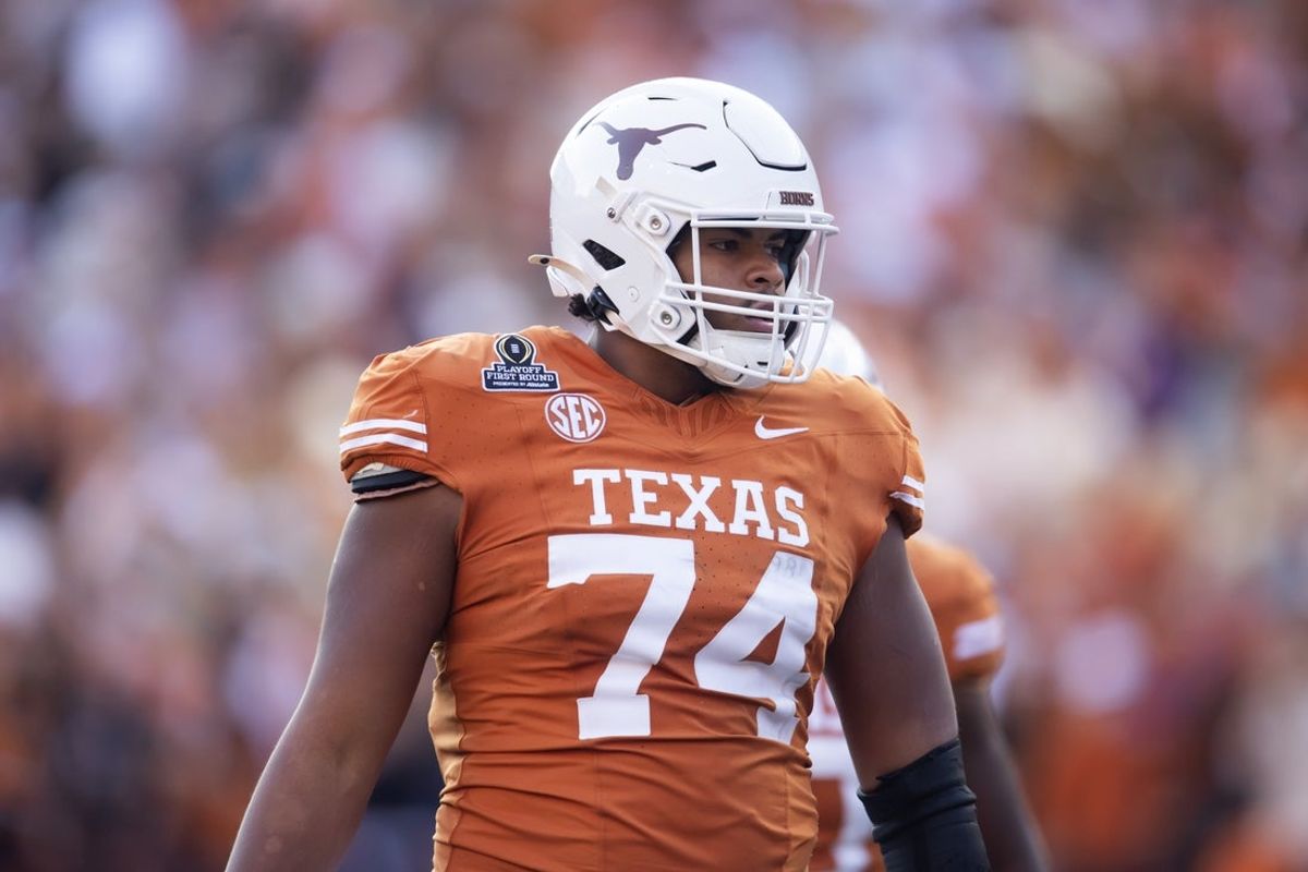 Dec 21, 2024; Austin, Texas, USA; Texas Longhorns offensive lineman Trevor Goosby (74) against the Clemson Tigers during the CFP National playoff first round at Darrell K Royal-Texas Memorial Stadium. Mandatory Credit: Mark J. Rebilas-Imagn Images