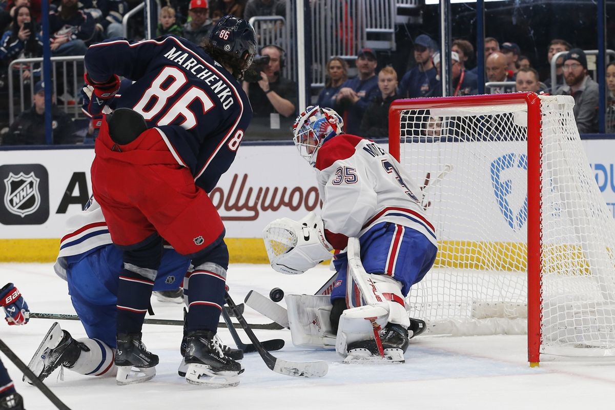 Dec 23, 2024; Columbus, Ohio, USA; Montreal Canadiens goalie Sam Montembeault (35) makes a save as Columbus Blue Jackets right wing Kirill Marchenko (86) looks for a rebound during the second period at Nationwide Arena. Mandatory Credit: Russell LaBounty-Imagn Images