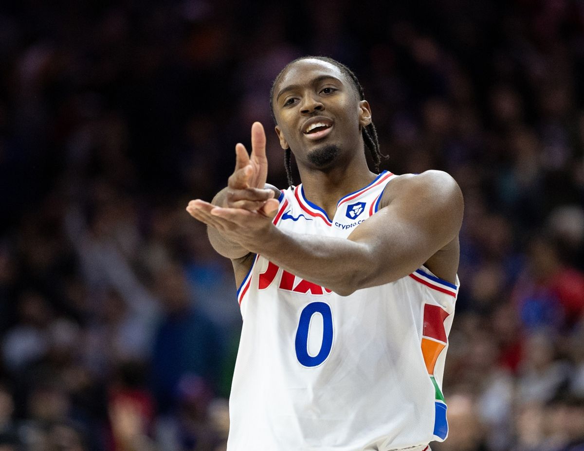 Dec 23, 2024; Philadelphia, Pennsylvania, USA; Philadelphia 76ers guard Tyrese Maxey (0) reacts to his three pointer in the closing moments of the game against the San Antonio Spurs at Wells Fargo Center. Mandatory Credit: Bill Streicher-Imagn Images
