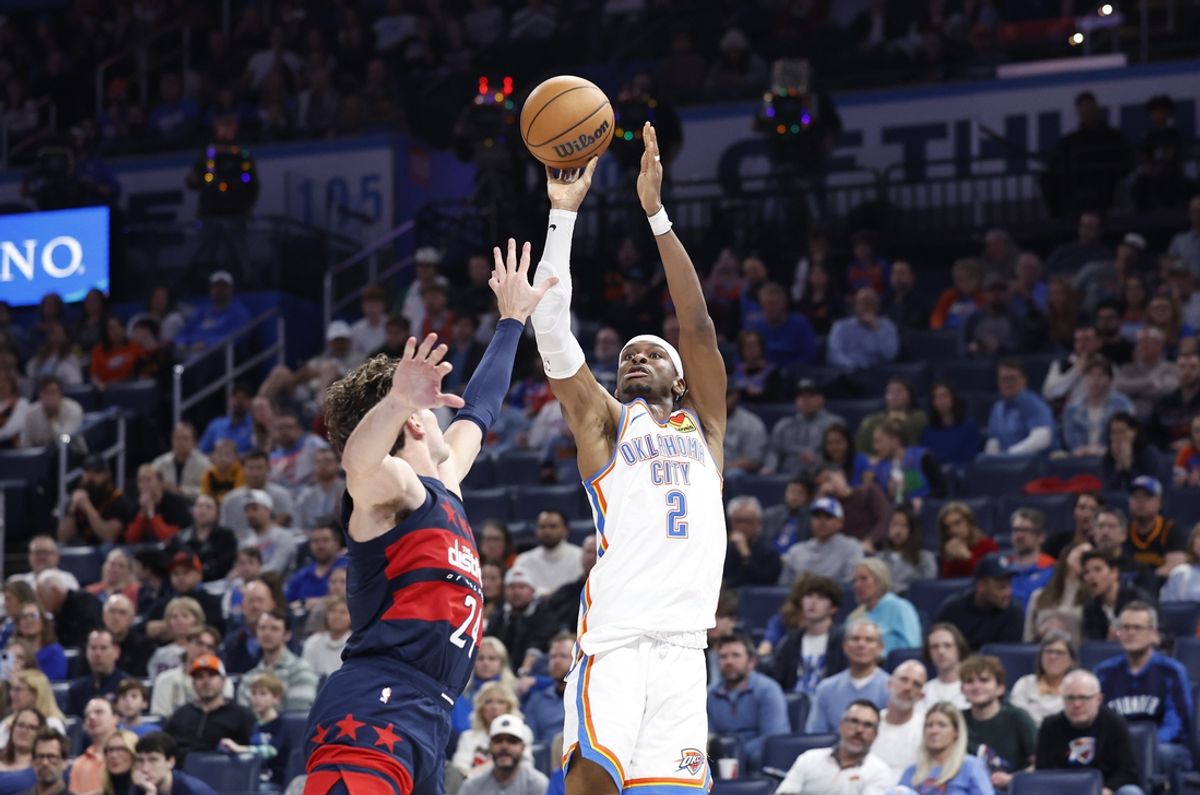 Dec 23, 2024; Oklahoma City, Oklahoma, USA; Oklahoma City Thunder guard Shai Gilgeous-Alexander (2) shoots against the Washington Wizards during the second half at Paycom Center. Mandatory Credit: Alonzo Adams-Imagn Images