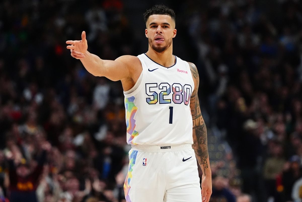 Dec 23, 2024; Denver, Colorado, USA; Denver Nuggets forward Aaron Gordon (32) reacts in the second half against the Phoenix Suns at Ball Arena. Mandatory Credit: Ron Chenoy-Imagn Images