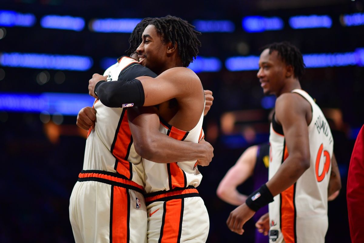 Dec 23, 2024; Los Angeles, California, USA; Detroit Pistons guard Jaden Ivey (23) celebrates the victory with forward Ausar Thompson (9) against the Los Angeles Lakers at Crypto.com Arena. Mandatory Credit: Gary A. Vasquez-Imagn Images