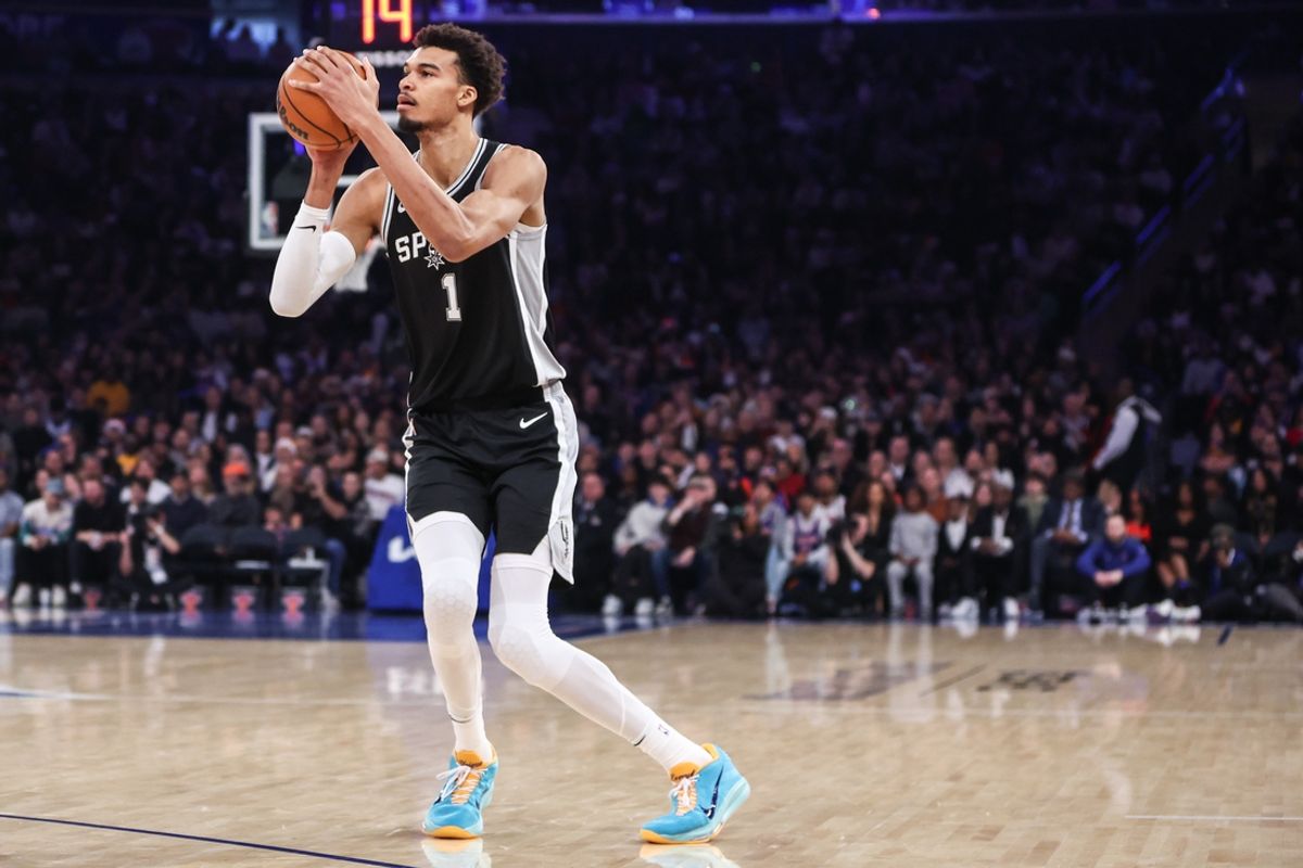 San Antonio Spurs center Victor Wembanyama (1) takes a three point shot in the first quarter against the New York Knicks at Madison Square Garden. Mandatory Credit: Wendell Cruz-Imagn Images