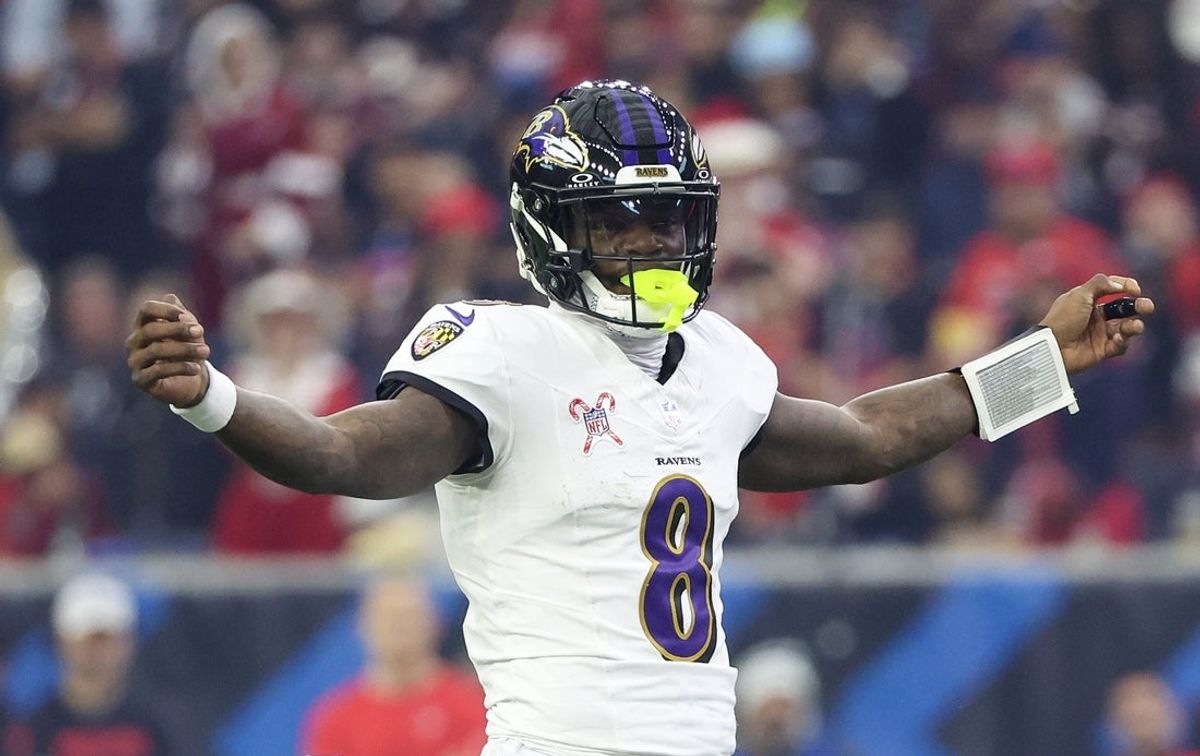Dec 25, 2024; Houston, Texas, USA;  Baltimore Ravens quarterback Lamar Jackson (8) reacts under center against the Houston Texans in the first quarter at NRG Stadium. Mandatory Credit: Thomas Shea-Imagn Images