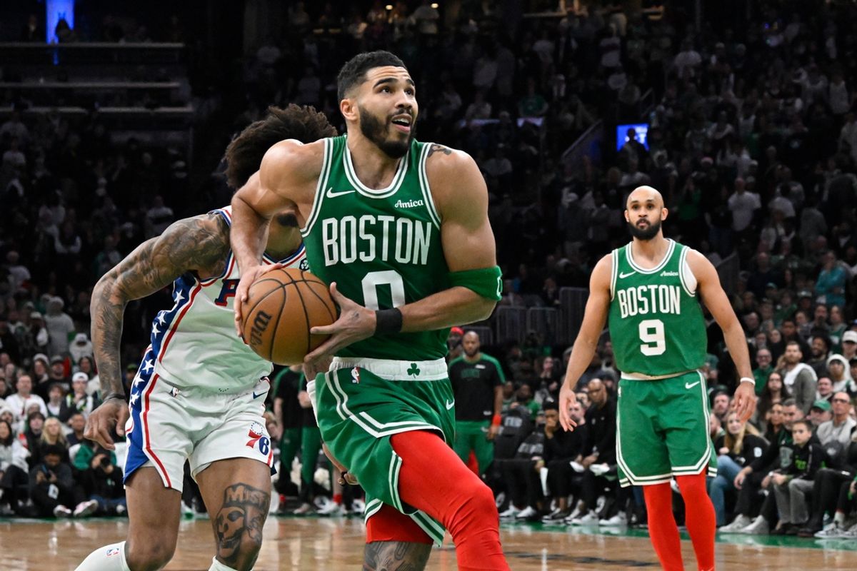 Dec 25, 2024; Boston, Massachusetts, USA; Boston Celtics forward Jayson Tatum (0) lines up for a dunk against the Philadelphia 76ers during the second half at TD Garden. Mandatory Credit: Eric Canha-Imagn Images