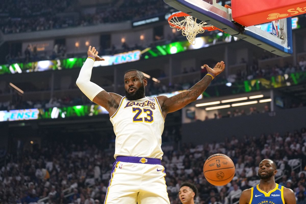 Dec 25, 2024; San Francisco, California, USA; Los Angeles Lakers forward LeBron James (23) gestures after dunking against the Golden State Warriors during the first quarter at Chase Center. Mandatory Credit: Darren Yamashita-Imagn Images
