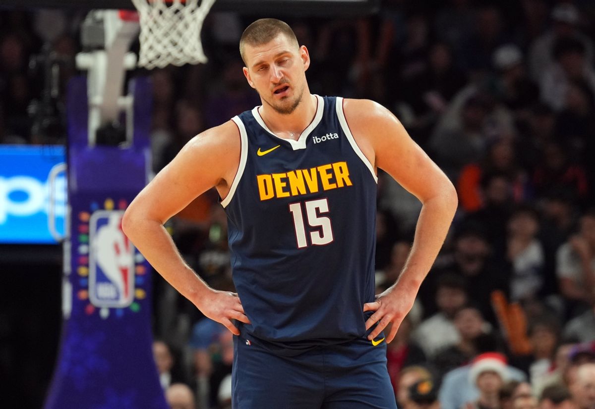 Dec 25, 2024; Phoenix, Arizona, USA; Denver Nuggets center Nikola Jokic (15) reacts against the Phoenix Suns during the second half at Footprint Center. Mandatory Credit: Joe Camporeale-Imagn Images
