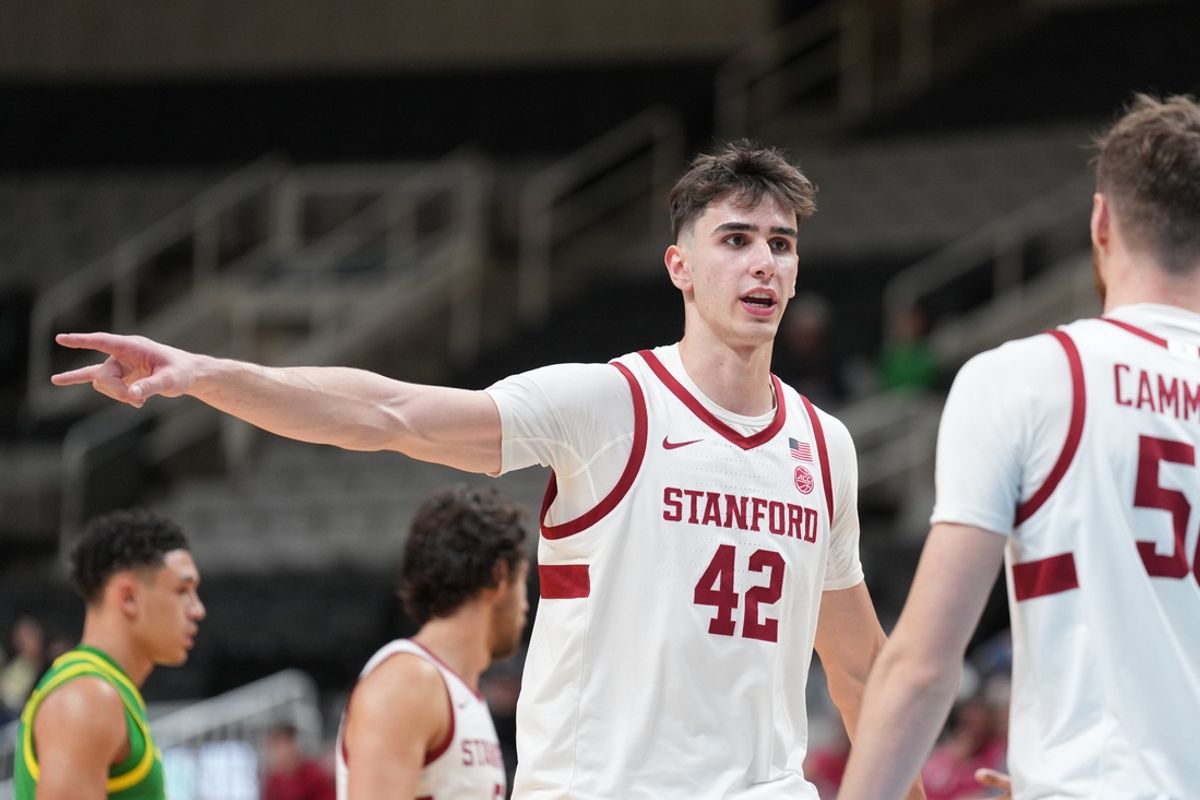 Dec 21, 2024; San Jose, California, USA; Stanford Cardinal forward Maxime Raynaud (42) talks with forward Aidan Cammann (right) during the second half against the Oregon Ducks at SAP Center at San Jose. Mandatory Credit: Darren Yamashita-Imagn Images