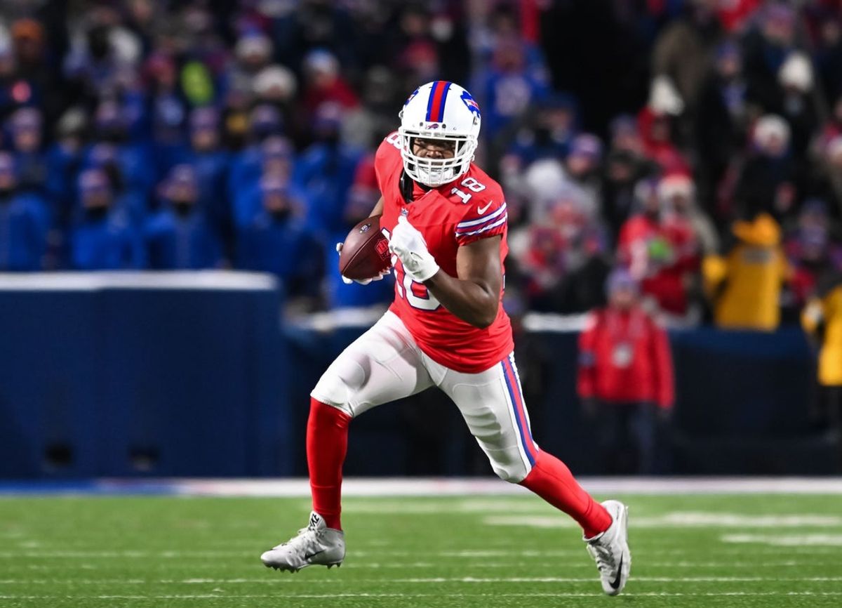 Dec 22, 2024; Orchard Park, New York, USA; Buffalo Bills wide receiver Amari Cooper (18) turns up field after making a catch in the second quarter against the New England Patriots at Highmark Stadium. Mandatory Credit: Mark Konezny-Imagn Images