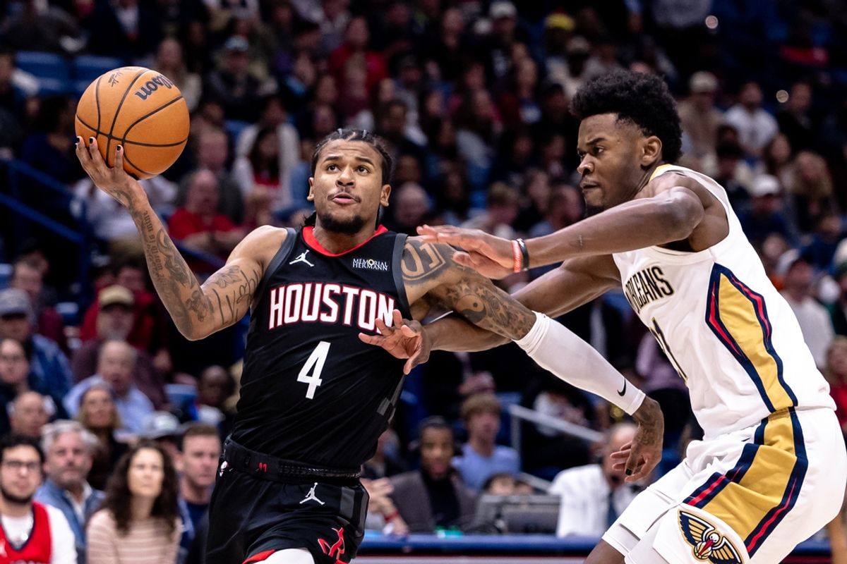 Dec 26, 2024; New Orleans, Louisiana, USA;  Houston Rockets guard Jalen Green (4) drives to the basket against New Orleans Pelicans center Yves Missi (21) during the first half at Smoothie King Center. Mandatory Credit: Stephen Lew-Imagn Images