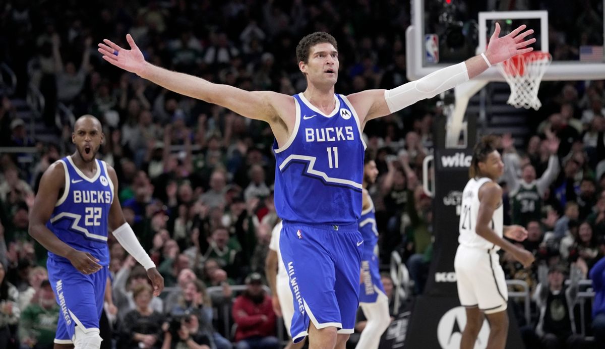 Bucks center Brook Lopez reacts after a draining a three-pointer during the first half against the Nets on Thursday night at Fiserv Form.Mark Hoffman/Milwaukee Journal Sentinel