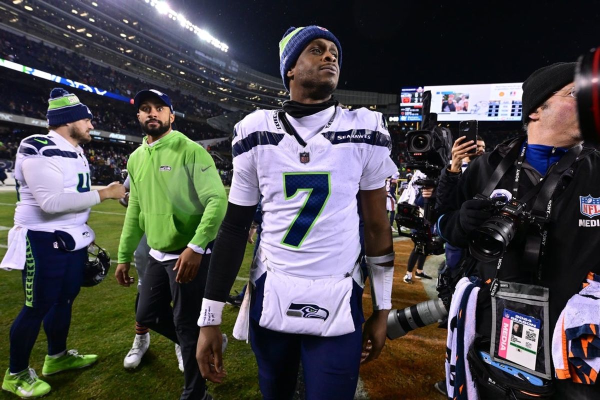 Dec 26, 2024; Chicago, Illinois, USA; Seattle Seahawks quarterback Geno Smith (7) walks off the field after the game against the Chicago Bears at Soldier Field. Mandatory Credit: Daniel Bartel-Imagn Images