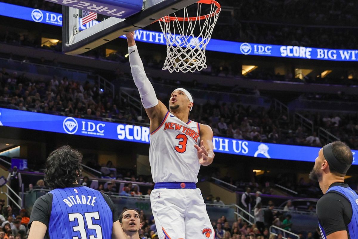 Dec 27, 2024; Orlando, Florida, USA; New York Knicks guard Josh Hart (3) lays up during the second quarter against the Orlando Magic at Kia Center. Mandatory Credit: Mike Watters-Imagn Images