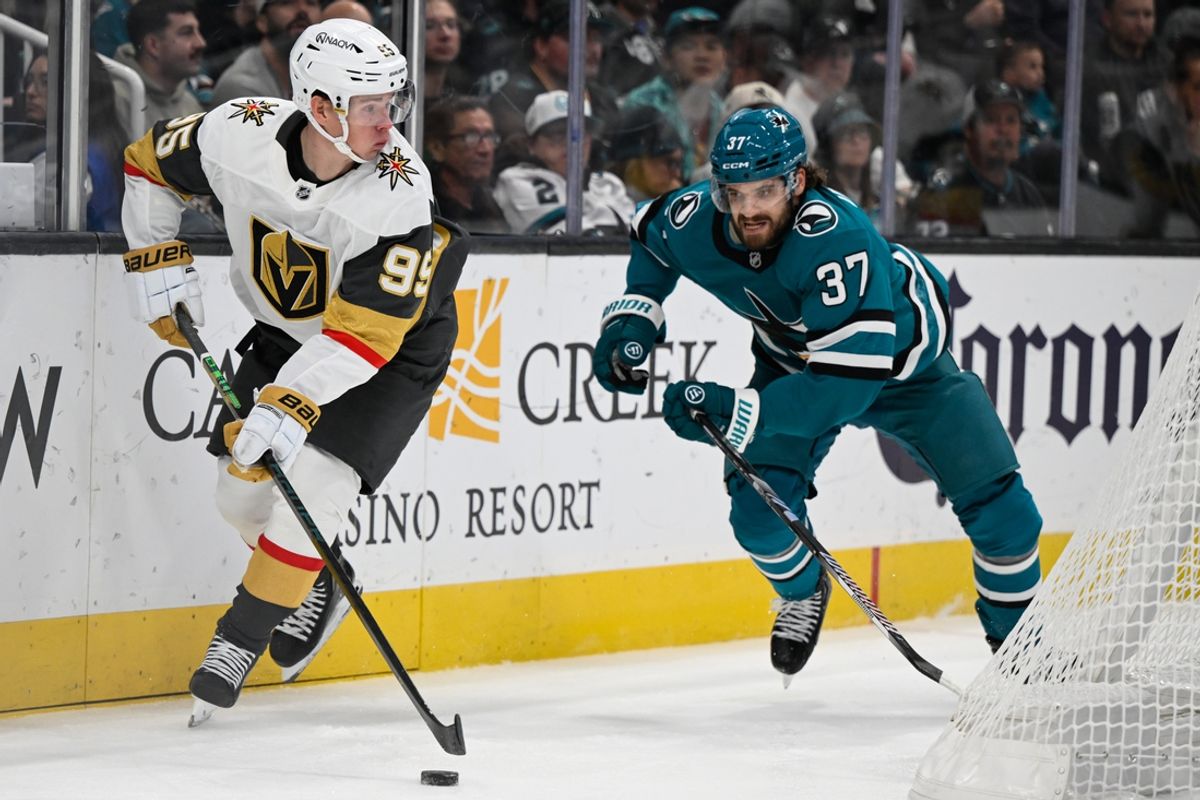 Dec 27, 2024; San Jose, California, USA; Vegas Golden Knights right wing Victor Olofsson (95) controls the puck against San Jose Sharks defenseman Timothy Liljegren (37) in the first period at SAP Center at San Jose. Mandatory Credit: Eakin Howard-Imagn Images