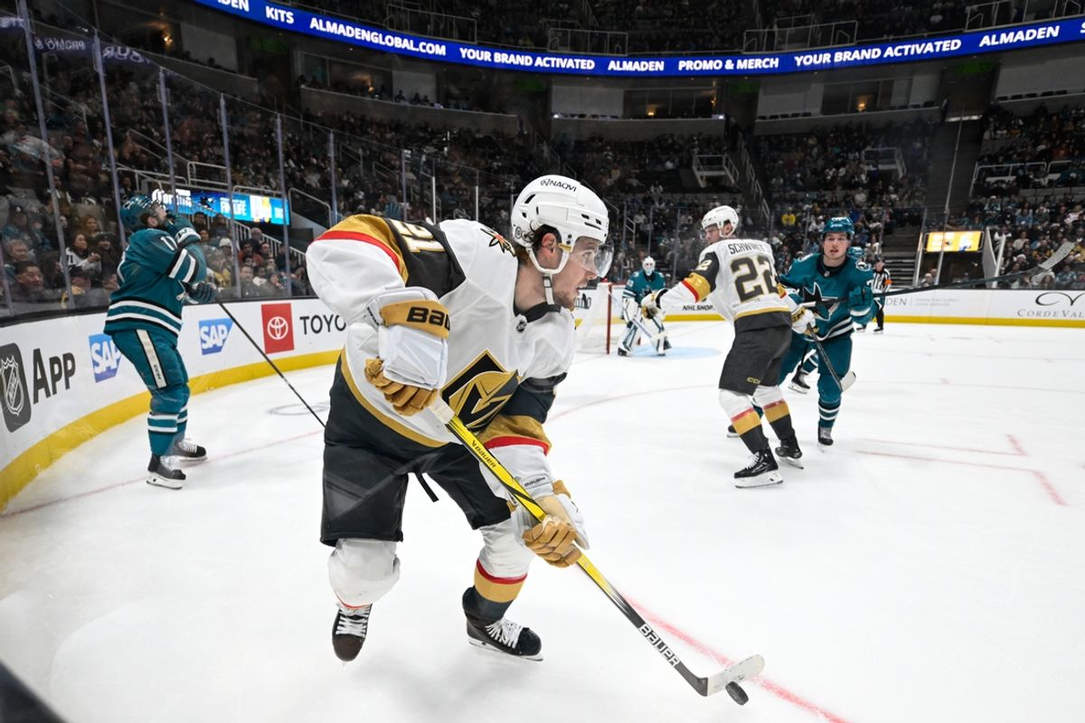 Dec 27, 2024; San Jose, California, USA; Vegas Golden Knights center Brett Howden (21) controls the puck against the San Jose Sharks in the third period at SAP Center at San Jose. Mandatory Credit: Eakin Howard-Imagn Images