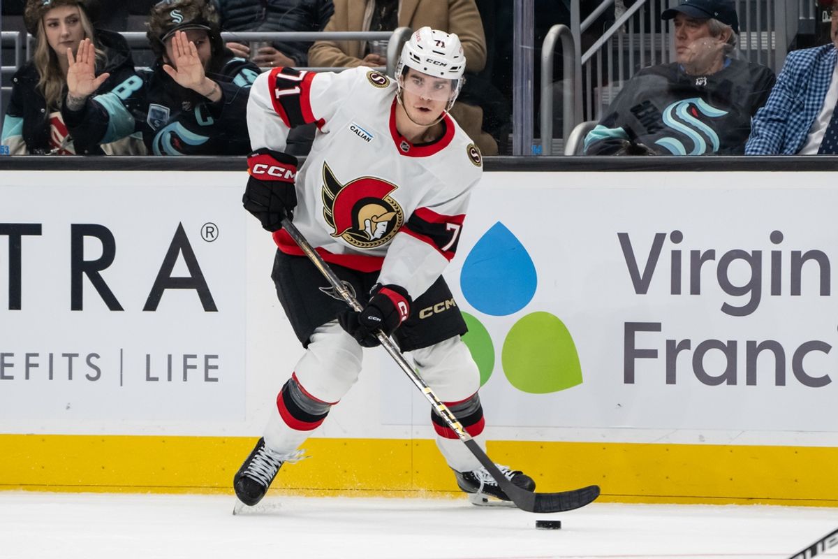 Dec 17, 2024; Seattle, Washington, USA;  Ottawa Senators forward Ridly Greig (71) skates with the puck against the Seattle Kraken at Climate Pledge Arena. Mandatory Credit: Stephen Brashear-Imagn Images