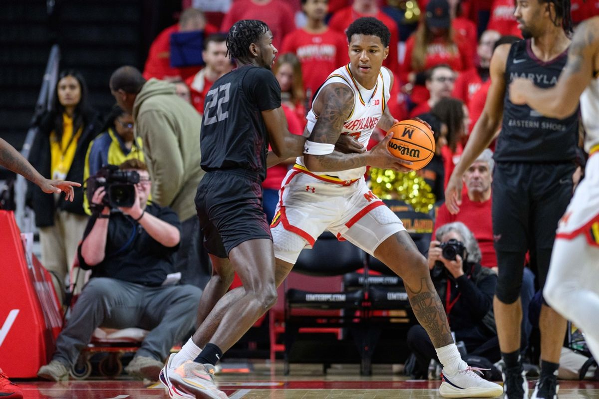 Dec 28, 2024; College Park, Maryland, USA; Maryland Terrapins forward Julian Reese (10) posts up against Maryland-Eastern Shore Hawks forward Maurice Vassel (22) during the first half at Xfinity Center. Mandatory Credit: Reggie Hildred-Imagn Images