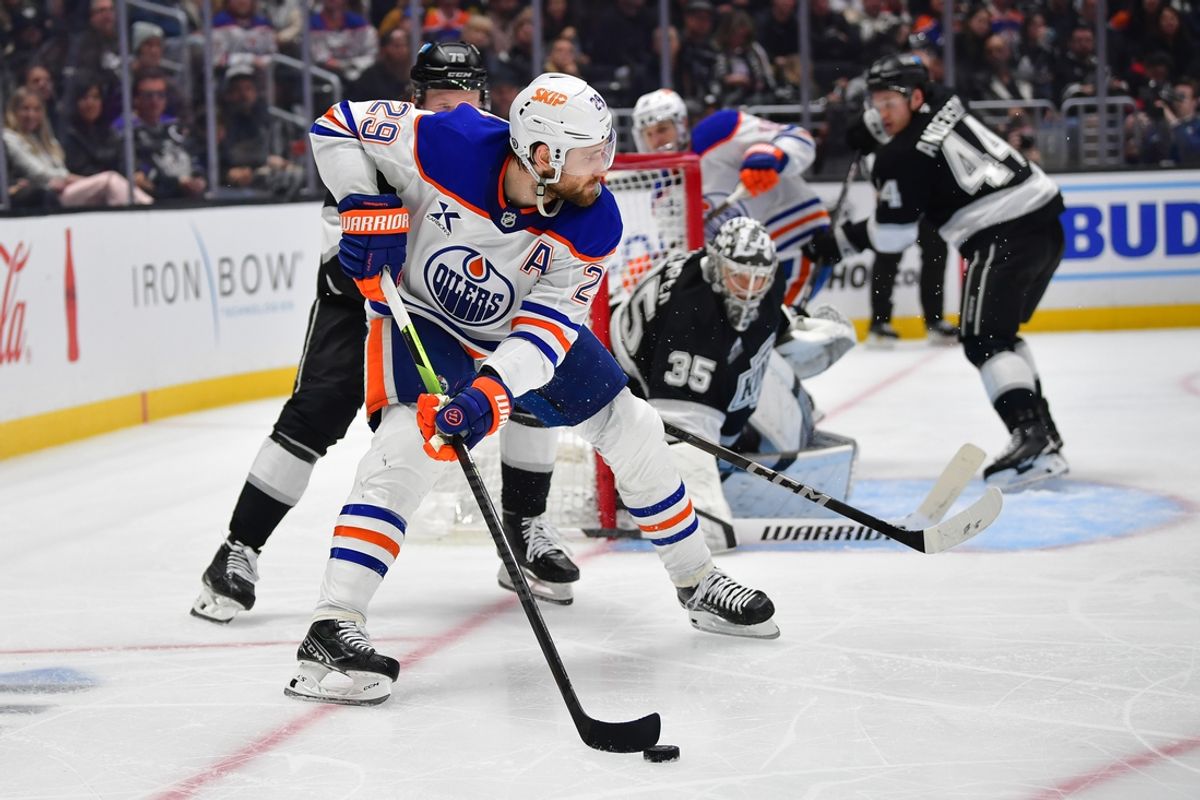 Dec 28, 2024; Los Angeles, California, USA; Edmonton Oilers center Leon Draisaitl (29) moves the puck against the Los Angeles Kings during the third period at Crypto.com Arena. Mandatory Credit: Gary A. Vasquez-Imagn Images