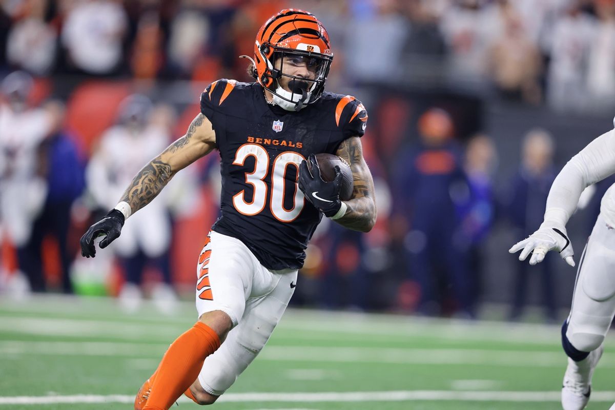 Dec 28, 2024; Cincinnati, Ohio, USA;  Cincinnati Bengals running back Chase Brown (30) runs the ball during the fourth quarter against the Denver Broncos at Paycor Stadium. Mandatory Credit: Joseph Maiorana-Imagn Images