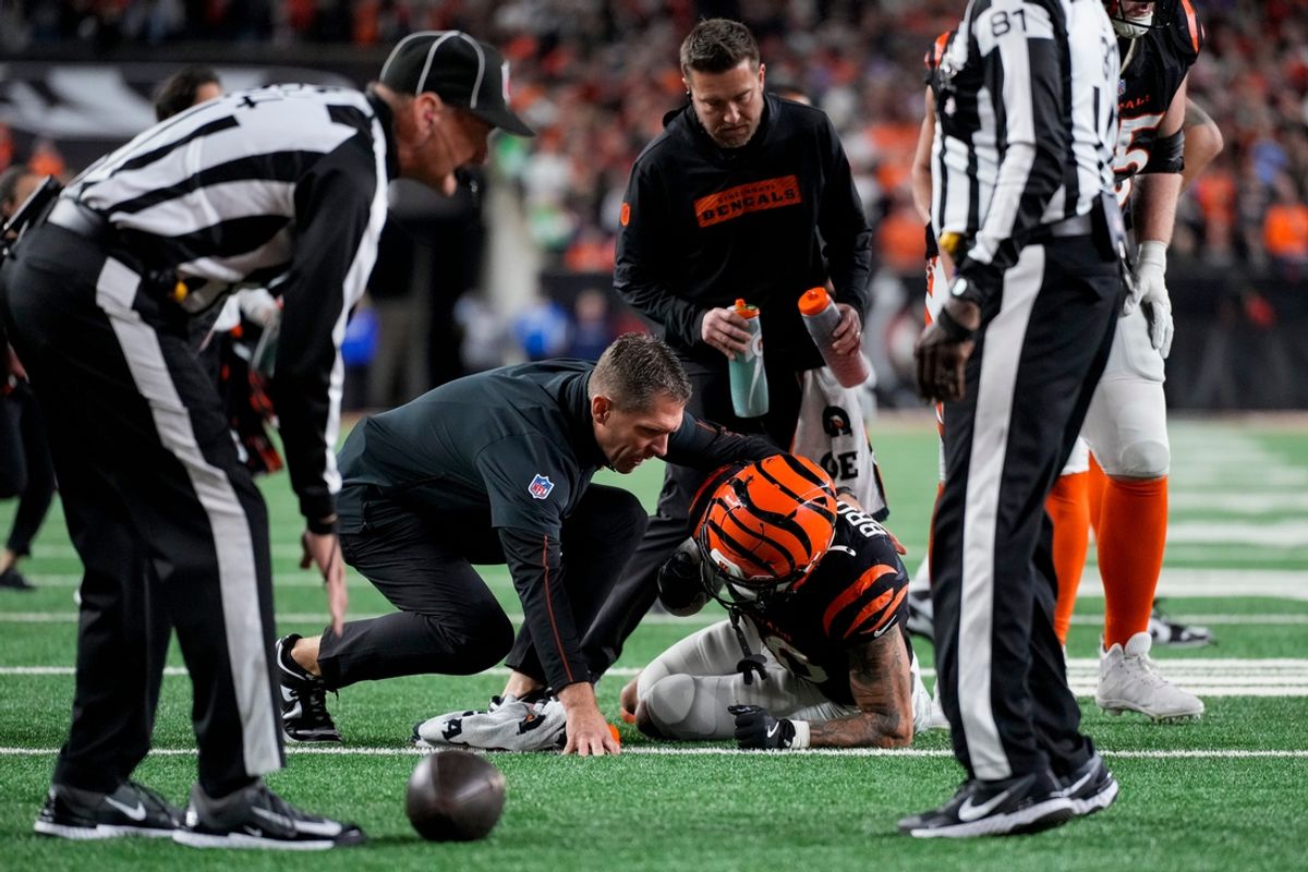 Bengals running back Chase Brown (30) is injured on a carry in the fourth quarter against the Broncos at Paycor Stadium on Saturday, Dec. 28, 2024.