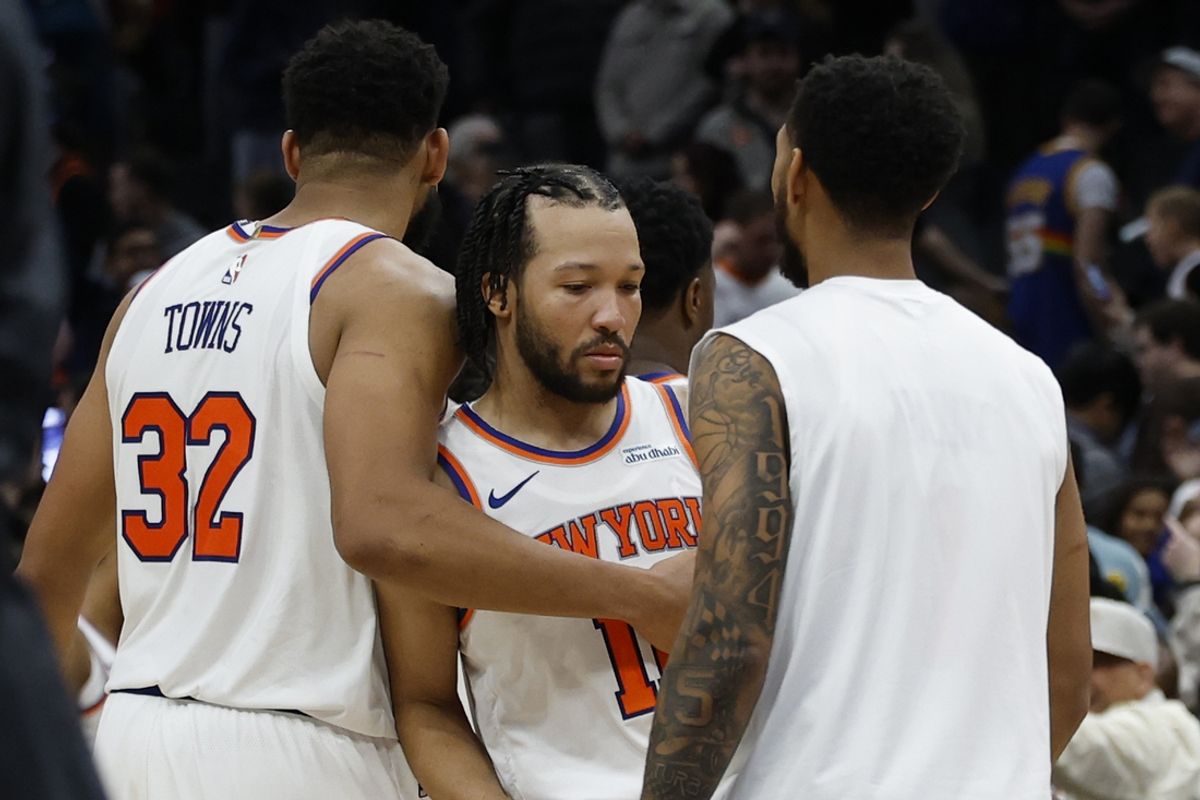 Dec 28, 2024; Washington, District of Columbia, USA; New York Knicks center Karl-Anthony Towns (32) hugs New York Knicks guard Jalen Brunson (11) after their game against the Washington Wizards at Capital One Arena. Mandatory Credit: Geoff Burke-Imagn Images