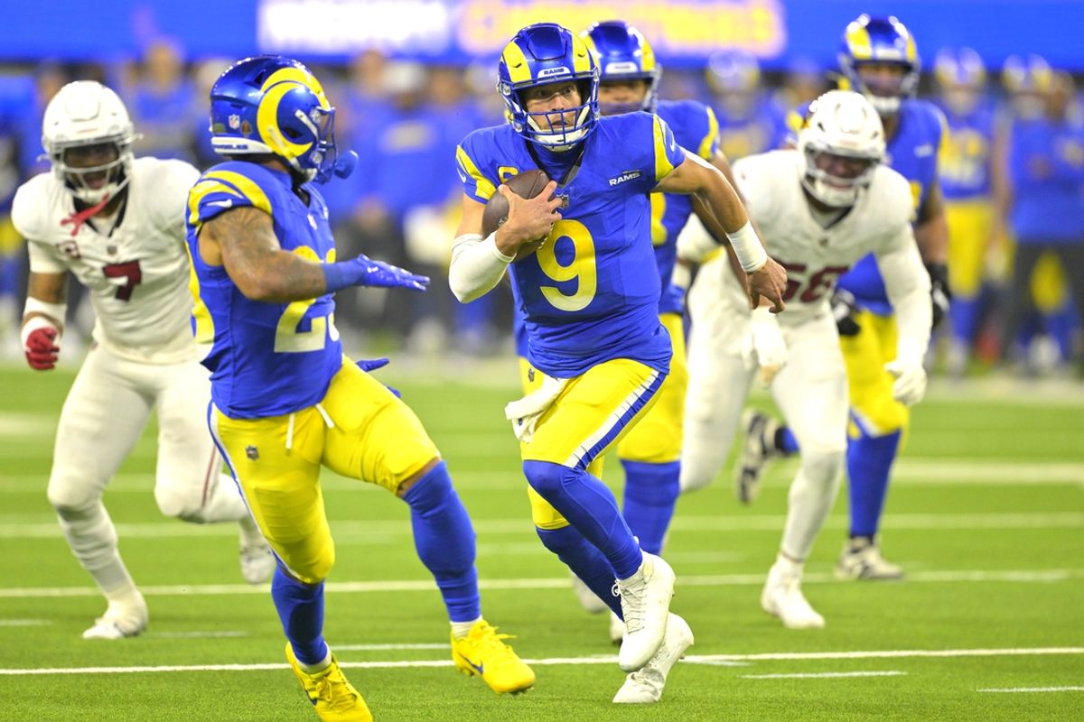 Dec 28, 2024; Inglewood, California, USA;   Los Angeles Rams quarterback Matthew Stafford (9) carries the ball to the 5-yard line in the first half against the Arizona Cardinals at SoFi Stadium. Mandatory Credit: Jayne Kamin-Oncea-Imagn Images
