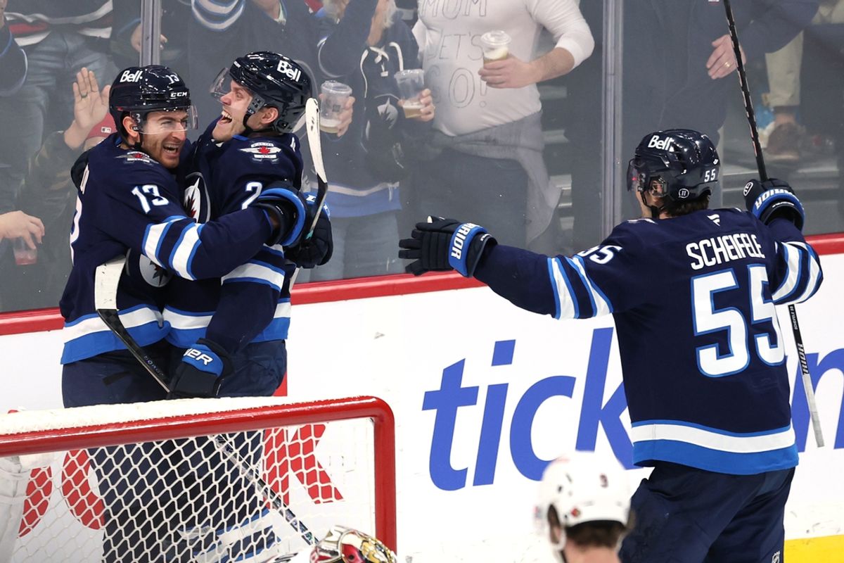 Dec 28, 2024; Winnipeg, Manitoba, CAN; Winnipeg Jets center Gabriel Vilardi (13) celebrates his third period goal with left wing Nikolaj Ehlers (27) and center Mark Scheifele (55) against the Ottawa Senators at Canada Life Centre. Mandatory Credit: James Carey Lauder-Imagn Images