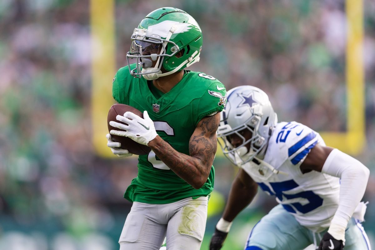 Dec 29, 2024; Philadelphia, Pennsylvania, USA; Philadelphia Eagles wide receiver DeVonta Smith (6) makes a first down catch past Dallas Cowboys cornerback Andrew Booth Jr. (25) during the second quarter at Lincoln Financial Field. Mandatory Credit: Bill Streicher-Imagn Images