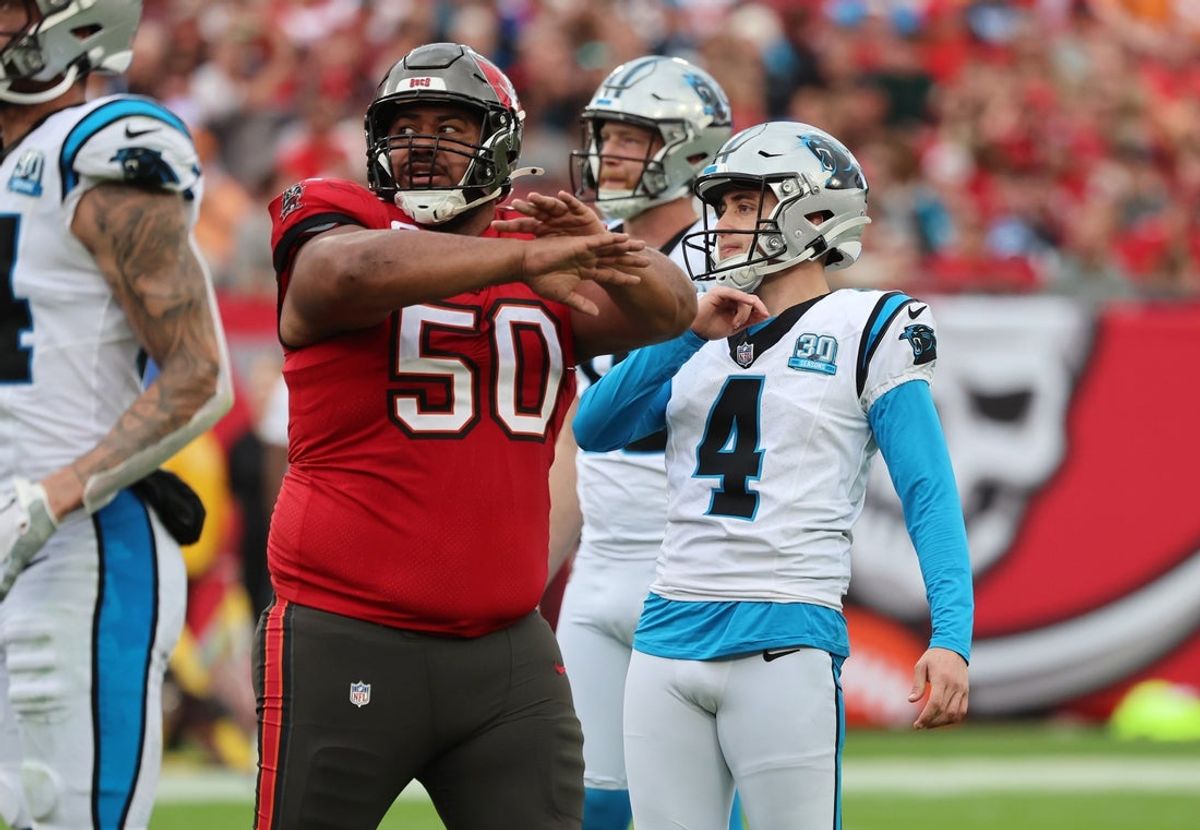 Dec 29, 2024; Tampa, Florida, USA; Tampa Bay Buccaneers defensive tackle Vita Vea (50) reacts after Carolina Panthers place kicker Eddy Pineiro (4) misses an extra point during the second quarter at Raymond James Stadium. Mandatory Credit: Kim Klement Neitzel-Imagn Images