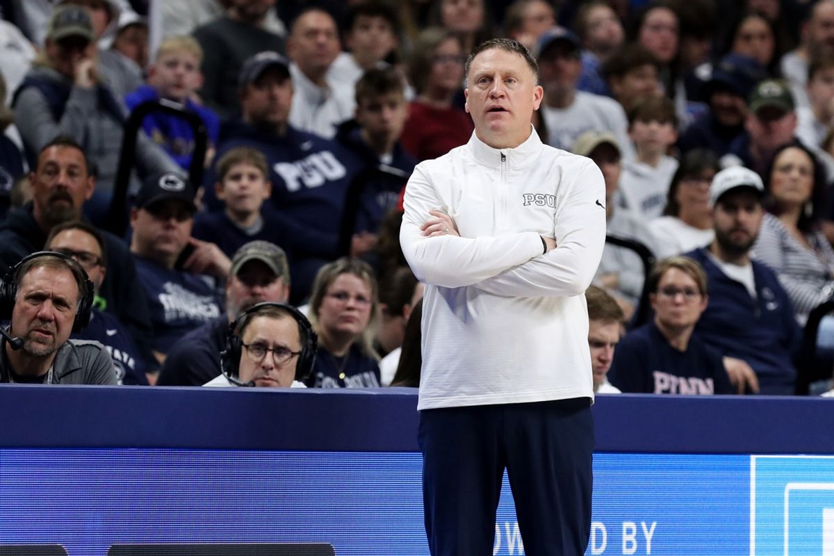 Dec 29, 2024; University Park, Pennsylvania, USA; Penn State Nittany Lions head coach Mike Rhoades looks on from the bench during the first half against the Penn Quakers at Bryce Jordan Center. Penn State defeated Penn 86-66. Mandatory Credit: Matthew O'Haren-Imagn Images