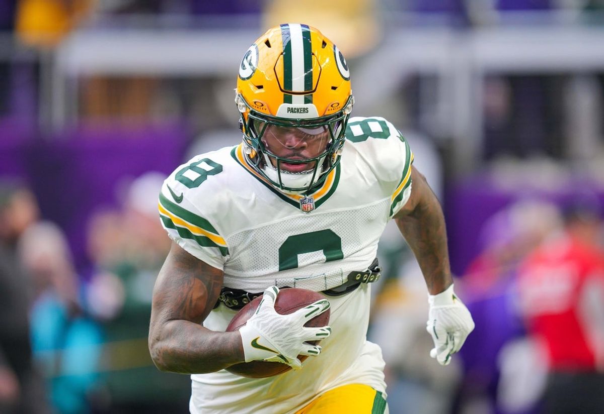 Dec 29, 2024; Minneapolis, Minnesota, USA; Green Bay Packers running back Josh Jacobs (8) warms up before the game against Minnesota Vikings at U.S. Bank Stadium. Mandatory Credit: Brad Rempel-Imagn Images