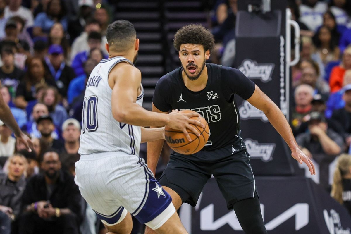 Dec 29, 2024; Orlando, Florida, USA; Brooklyn Nets forward Cameron Johnson (2) defends Orlando Magic guard Cory Joseph (10) during the second quarter at Kia Center. Mandatory Credit: Mike Watters-Imagn Images