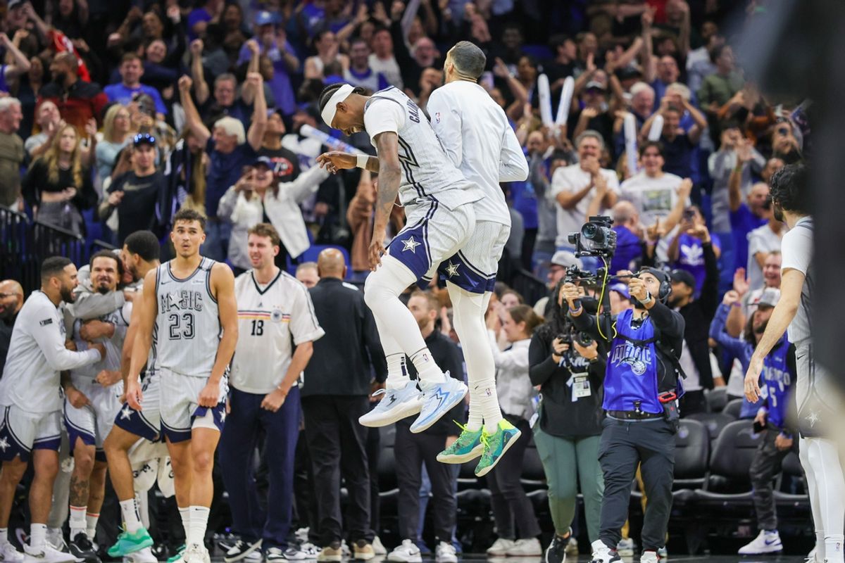 Dec 29, 2024; Orlando, Florida, USA; Orlando Magic celebrate their 102-101 win against the Brooklyn Nets at Kia Center. Mandatory Credit: Mike Watters-Imagn Images