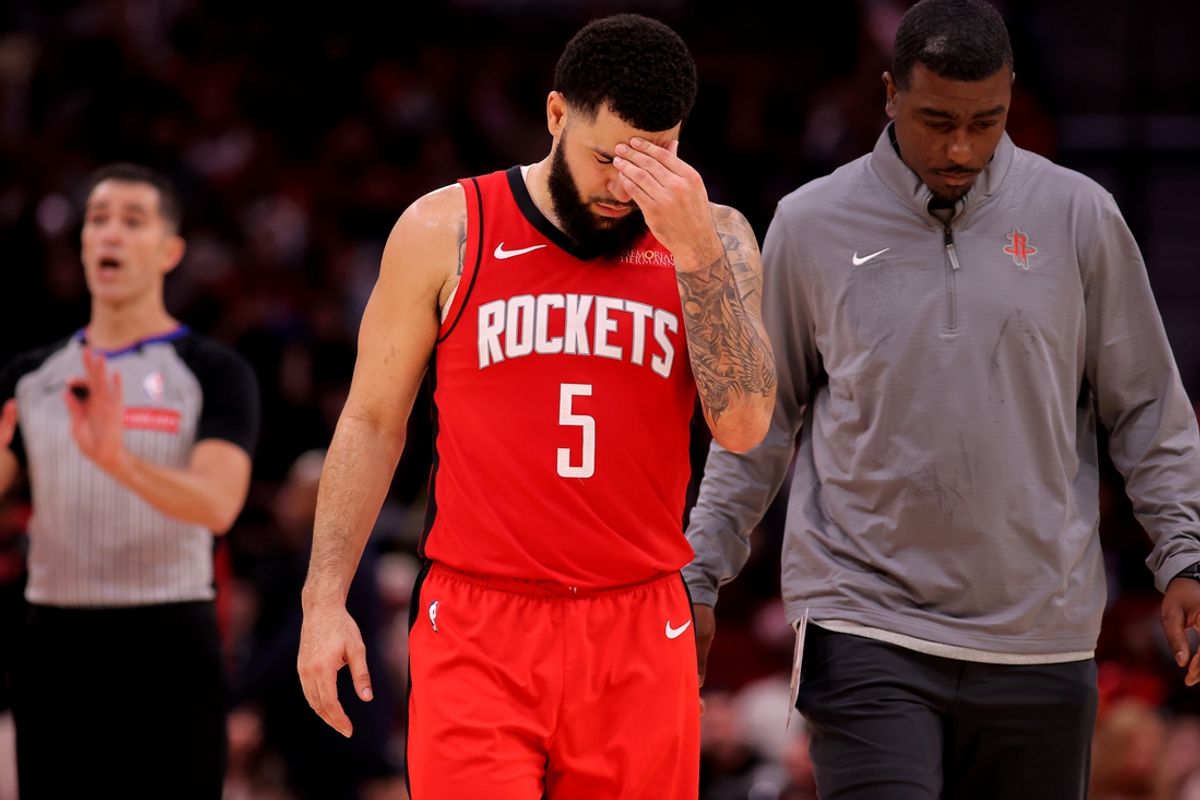 Dec 29, 2024; Houston, Texas, USA; Houston Rockets guard Fred VanVleet (5) is escorted off the court after being ejected against the Miami Heat during the fourth quarter at Toyota Center. Mandatory Credit: Erik Williams-Imagn Images