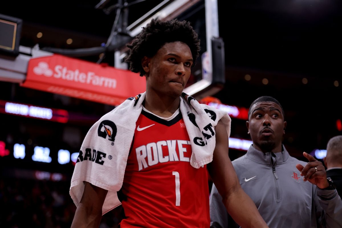 Dec 29, 2024; Houston, Texas, USA; Houston Rockets guard Amen Thompson (1) is escorted off the court after being ejected against the Miami Heat during the fourth quarter at Toyota Center. Mandatory Credit: Erik Williams-Imagn Images