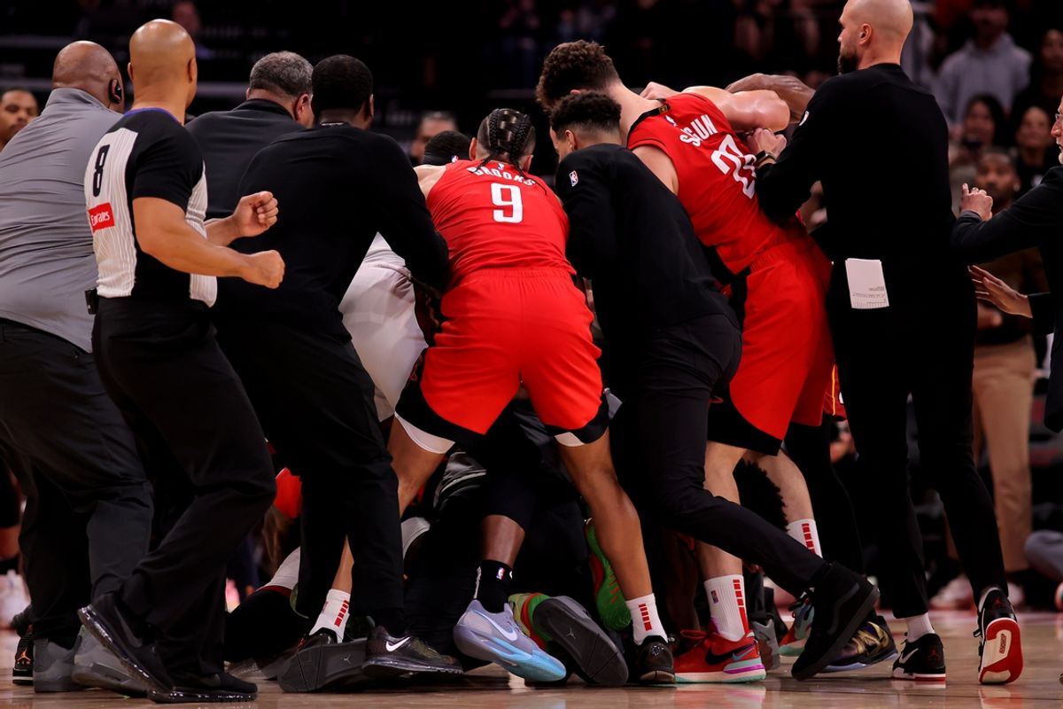 Dec 29, 2024; Houston, Texas, USA; Houston Rockets and Miami Heat players break up a fight between Houston Rockets guard Amen Thompson (1) and Miami Heat guard Tyler Herro (14) during the fourth quarter at Toyota Center. Mandatory Credit: Erik Williams-Imagn Images