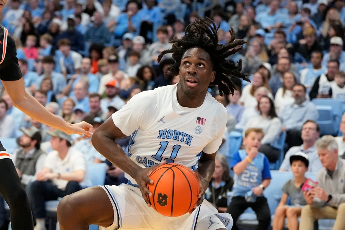 Dec 29, 2024; Chapel Hill, North Carolina, USA; North Carolina Tar Heels guard Ian Jackson (11) with the ball in the second half at Dean E. Smith Center. Mandatory Credit: Bob Donnan-Imagn Images
