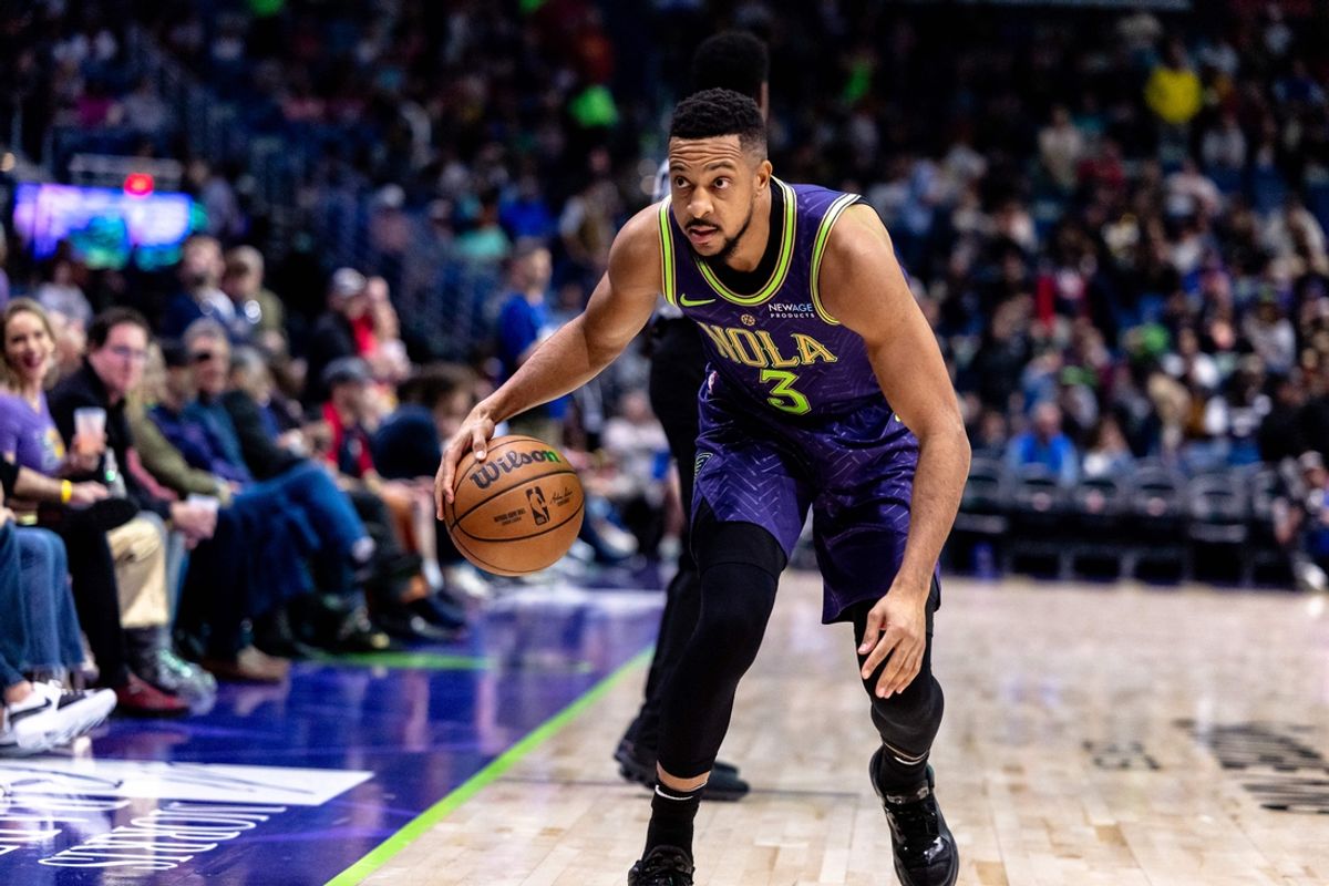 Dec 30, 2024; New Orleans, Louisiana, USA; New Orleans Pelicans guard CJ McCollum (3) dribbles against the LA Clippers during the first half at Smoothie King Center. Mandatory Credit: Stephen Lew-Imagn Images
