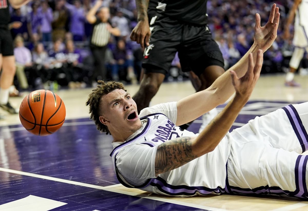 Dec 30, 2024; Manhattan, Kansas, USA; Kansas State Wildcats guard Coleman Hawkins (33) reacts during the second half against the Cincinnati Bearcats at Bramlage Coliseum. Mandatory Credit: Jay Biggerstaff-Imagn Images
