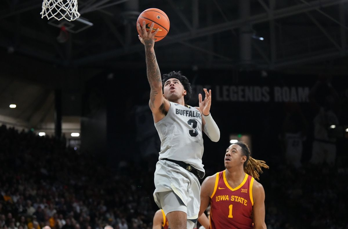 Dec 30, 2024; Boulder, Colorado, USA; Colorado Buffaloes guard Julian Hammond III (3) shoots past Iowa State Cyclones center Dishon Jackson (1) in the second half at CU Events Center. Mandatory Credit: Ron Chenoy-Imagn Images
