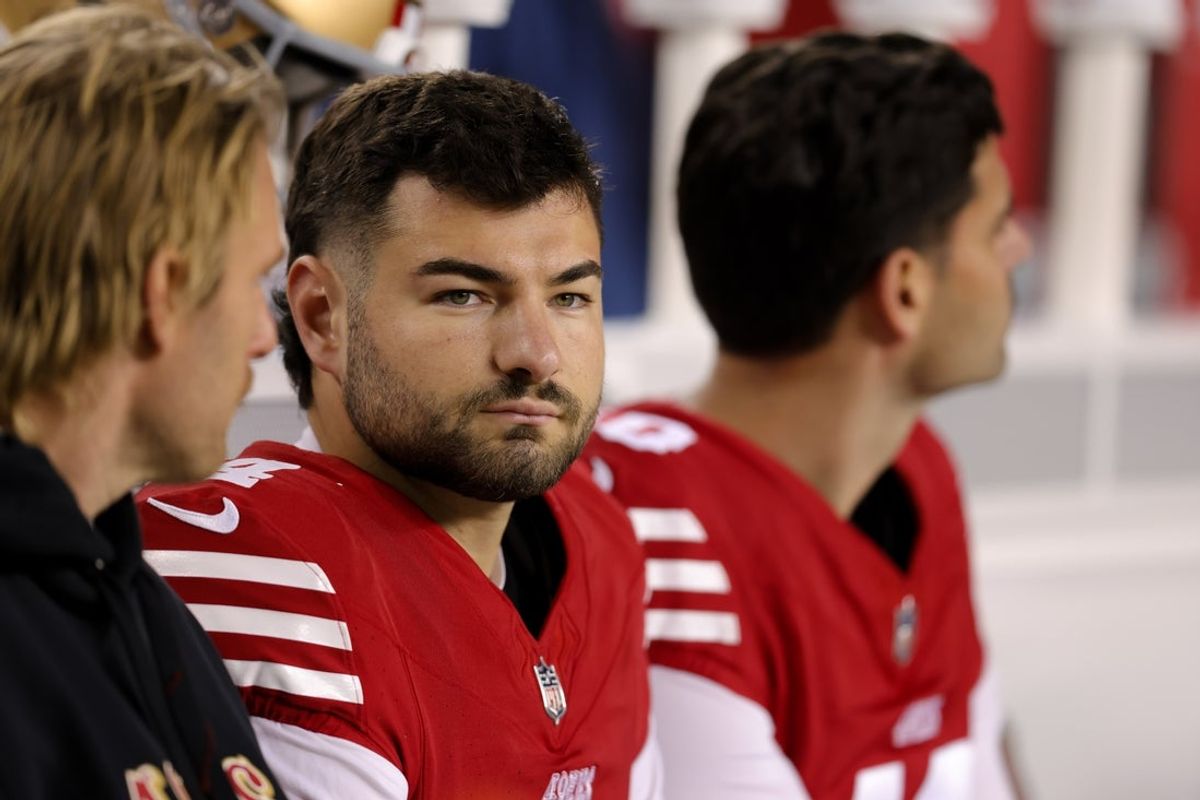 Dec 30, 2024; Santa Clara, California, USA; San Francisco 49ers place kicker Jake Moody (4) sits on the bench after missing a field goal during the fourth quarter against the Detroit Lions at Levi's Stadium. Mandatory Credit: Sergio Estrada-Imagn Images