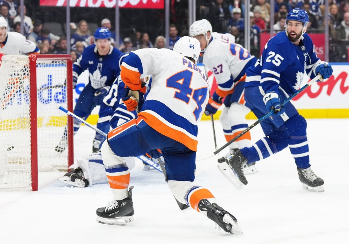 Dec 31, 2024; Toronto, Ontario, CAN; New York Islanders center Jean-Gabriel Pageau (44) scores a goal against the Toronto Maple Leafs during the second period at the Scotiabank Arena. Mandatory Credit: Nick Turchiaro-Imagn Images