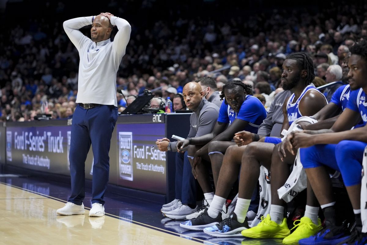 Dec 31, 2024; Cincinnati, Ohio, USA;  Seton Hall Pirates head coach Shaheen Holloway reacts from the sideline against the Xavier Musketeers in the first half at the Cintas Center. Mandatory Credit: Aaron Doster-Imagn Images