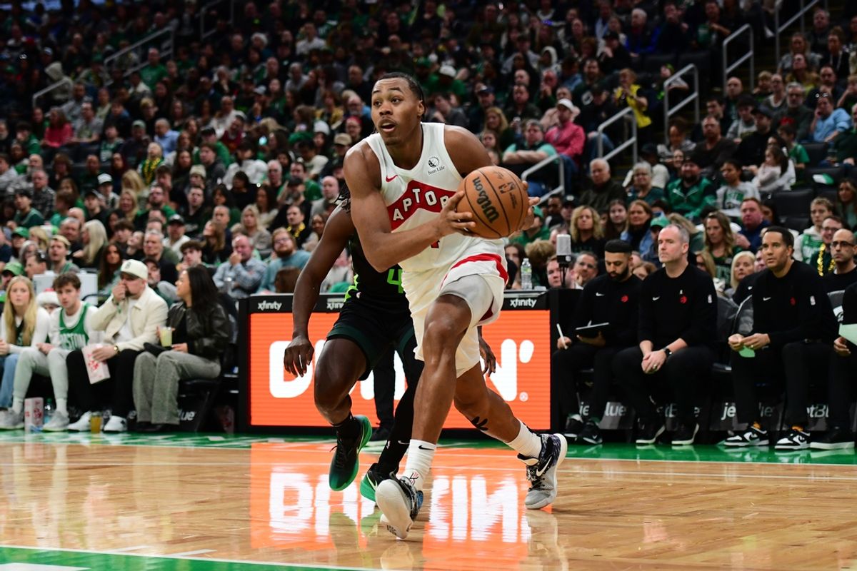 Dec 31, 2024; Boston, Massachusetts, USA;  Toronto Raptors forward Scottie Barnes (4) controls the ball during the second half against the Boston Celtics at TD Garden. Mandatory Credit: Bob DeChiara-Imagn Images