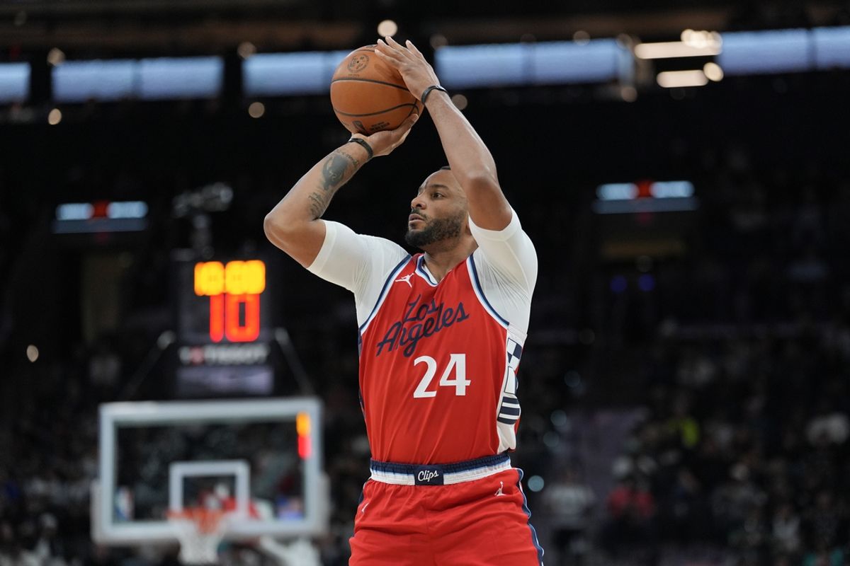 Dec 31, 2024; San Antonio, Texas, USA;  LA Clippers guard Norman Powell (24) shoots in the first half against the San Antonio Spurs at Frost Bank Center. Mandatory Credit: Daniel Dunn-Imagn Images