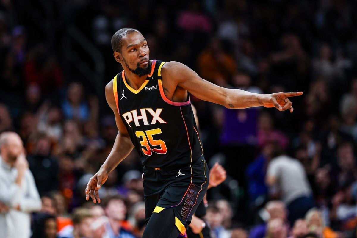 Dec 31, 2024; Phoenix, Arizona, USA; Phoenix Suns forward Kevin Durant (35) points to his teammate after he makes a three pointer during the second quarter of the game against the Memphis Grizzlies at Footprint Center. Mandatory Credit: Aryanna Frank-Imagn Images