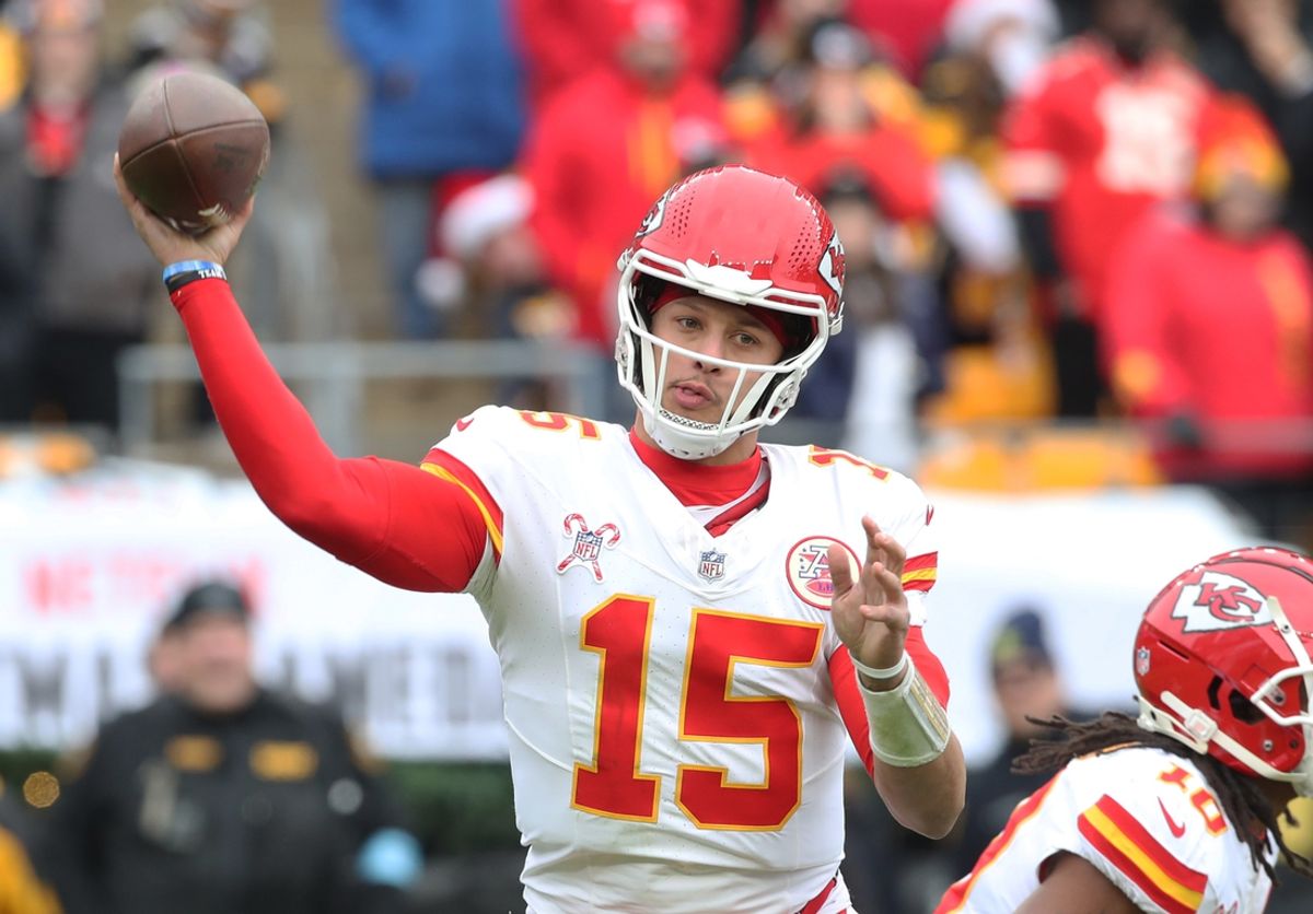 Dec 25, 2024; Pittsburgh, Pennsylvania, USA;  Kansas City Chiefs quarterback Patrick Mahomes (15) passes against the Pittsburgh Steelers during the second quarter at Acrisure Stadium. Mandatory Credit: Charles LeClaire-Imagn Images