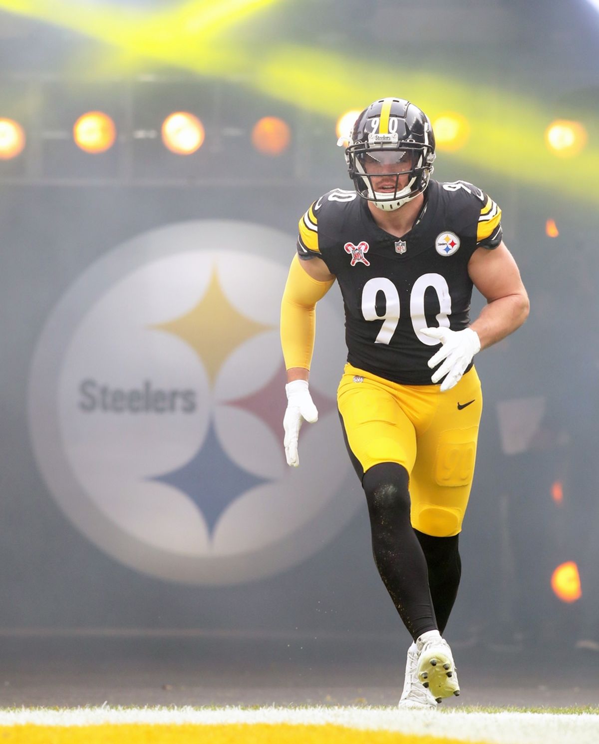 Dec 25, 2024; Pittsburgh, Pennsylvania, USA;  Pittsburgh Steelers linebacker T.J. Watt (90) takes the field against the Kansas City Chiefs at Acrisure Stadium. Mandatory Credit: Charles LeClaire-Imagn Images