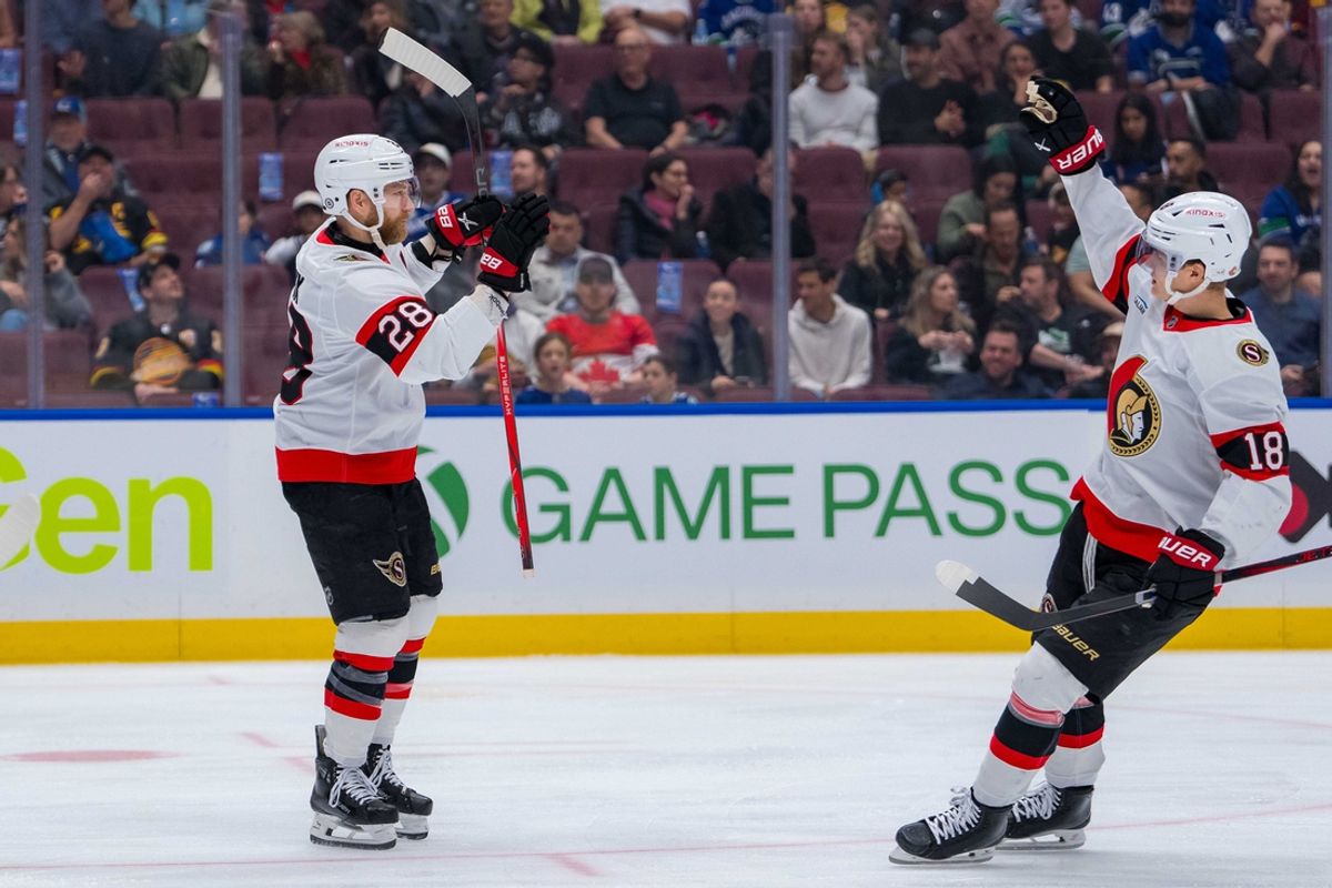 Dec 21, 2024; Vancouver, British Columbia, CAN; Ottawa Senators forward Claude Giroux (28) and forward Tim Stützle (18) celebrate Giroux’s goal against the Vancouver Canucks during the first period at Rogers Arena. Mandatory Credit: Bob Frid-Imagn Images