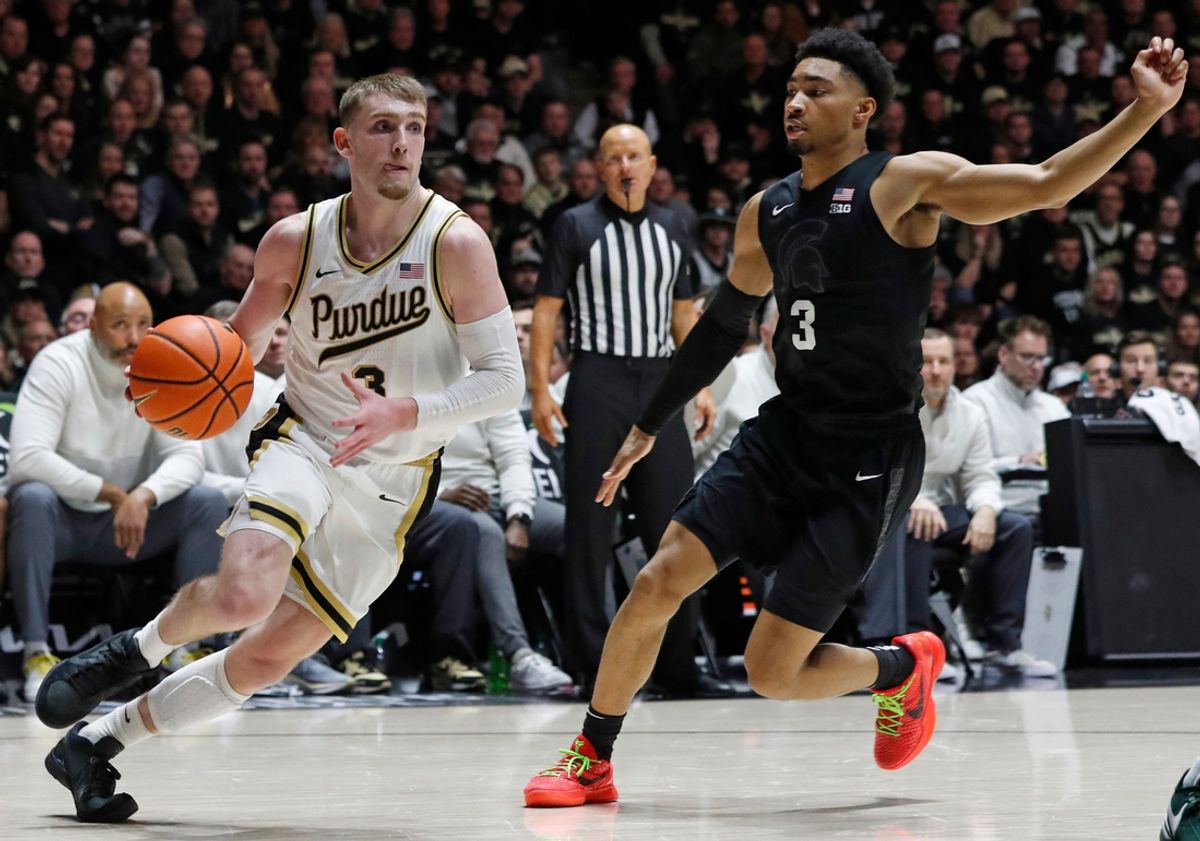 Purdue Boilermakers guard Braden Smith (3) drives past Michigan State Spartans guard Jaden Akins (3) during the NCAA menâ€™s basketball game, Saturday, March 2, 2024, at Mackey Arena in West Lafayette, Ind. Purdue Boilermakers 80-74.